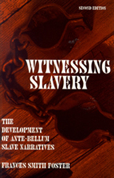Cover of book is red with white type, and there is a red and black photo of chains in the background.