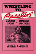 Cover is pink, with illustration of a wrestler.