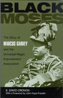 the cover of Black Moses is green and black, with a green tinted photo of Marcus Garvey in a military-style uniform.