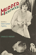 cover of Higham features an old photo of a murdered director with a disturbed woman standing over his body