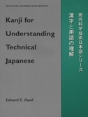 Cover of book is gray and green, with black writing.