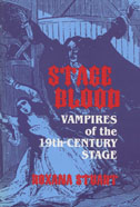 Cover of book is dark blue with an image of a vampire scaring a woman.