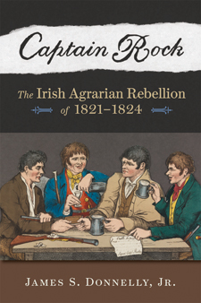 The cover of Captain Rock features a colored illustration of four Irishmen at a rude table with tankards, a rifle and a paper.