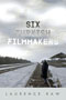Six Turkish Filmmakers: cover art of snowy train tracks, a person standing upon the tracks, their back to the viewer. A gray sky dominates most of the image, with a forest hovering on the horizon in the distance.