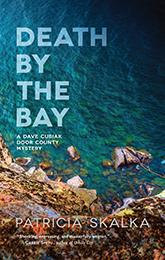 Book cover showing view from cliff overlooking a body of water