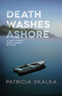 Death Washes Ashore: the cover shows a picture of a lone canoe on a foggy lake, a forest at the water's edge. The title text is written in transparent white font at the top half of the page. Design by Sara DeHaan.