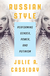 Russian Style: a drag queen wearing a top make of gemstones is mirrored so that one half of her face is visible on the left side of the cover and the other side is visible on the right side of the cover. The title text is written in bold yellow font, with the subtitle contained within a baby blue rectangle in the center of the page.