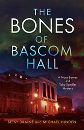 Bones of Bascom Hall: cover depicting Bascom Hall at night, a dark, cloudy sky looming above it. The image has a rainbow filter over it, but the ominous quality of the picture means that the color does not add any joviality to the cover.