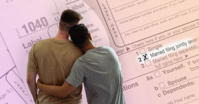 same sex couple with tax form