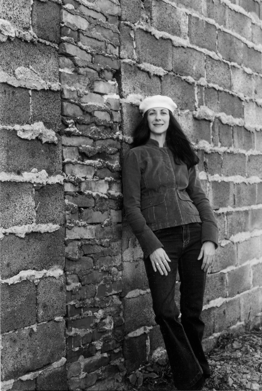 this is a large 300 dpi photo of the author Corso, leaning against a brick wall, for publicity use only.